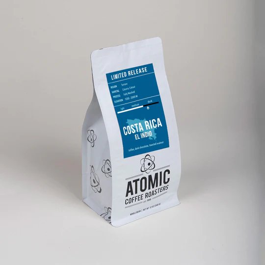 A bag of Atomic Coffee Roaster Beans titled "Costa Rica"